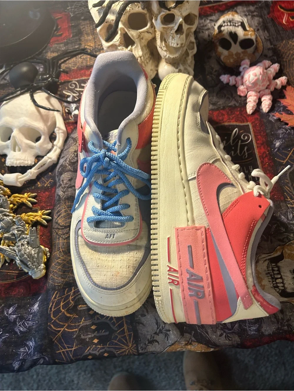 Nike White and Blue Athletic Shoes with Pink Accent